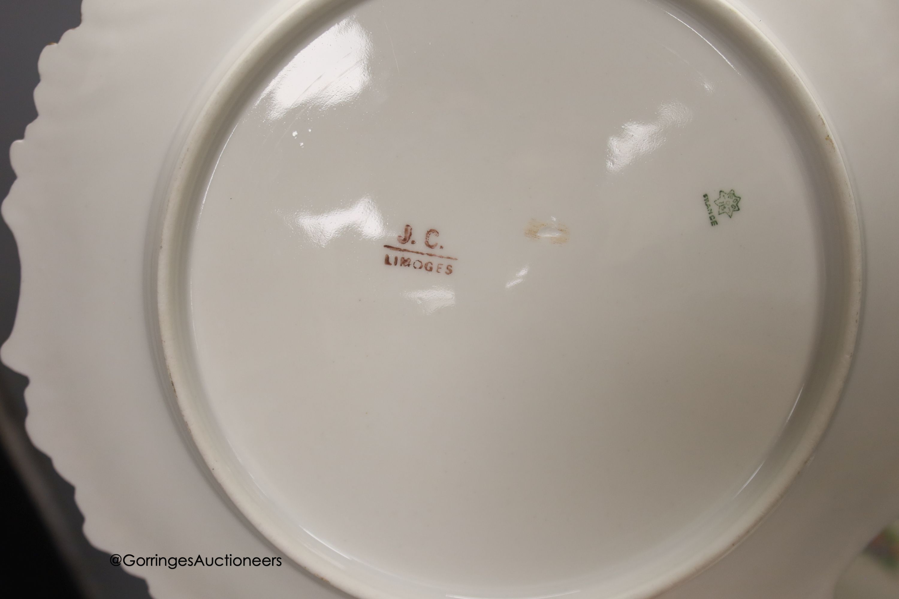 Two sets of six Limoges dessert plates, three English porcelain ribbon plates, an Alfred Pearce Aynsley dessert plate and a Worcester cup and saucer